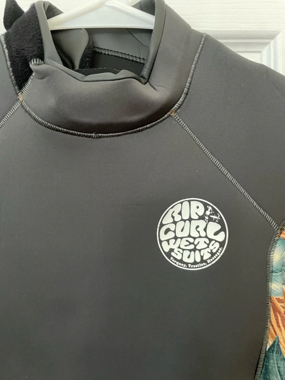 Rip Curl Black Shorty Wetsuit with Subtle Print Trim